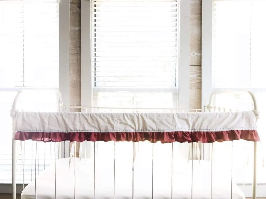 White and Blush Ruffled Crib Rail Cover